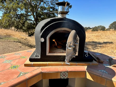 Outdoor Pizza Oven Mission Plus Steel by Artistic Ovens Customer Eduardo  on fire